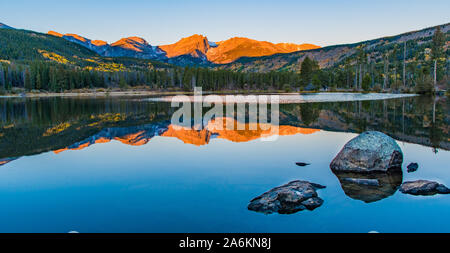 Sprague Lake Reflecting Mountains in Rocky Mountain National Park Stock Photo