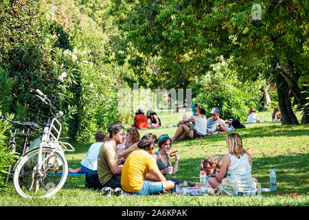 Barcelona Spain,Catalonia El Born,historic district,Ciutat Vella,Parc de la Ciutadella,Citadel Park,lawn,garden,man,woman,family,picnic,friends,ES1908 Stock Photo