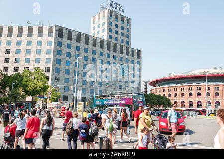 Barcelona Spain,Catalonia Sants Montjuic,Plaza de Espana Placa d'Espanya,public square,Catalonia Plaza Hotel,building exterior,clock,pedestrians,traff Stock Photo