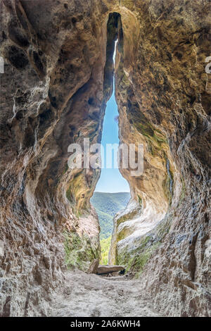 The womb cave also known as Utroba cave near Kardzhali city in Rhodope mountain in Bulgaria Stock Photo