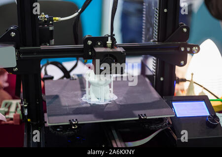 Process of printing plastic model on automatic 3d printer machine Stock Photo