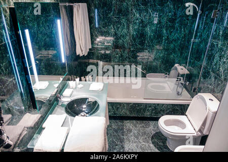 Tarragona Spain Hispanic AC Hotel Tarragona by Marriott,guest marble,toilet loo,contemporary glass vanity,toiletries,ES1 Photo Alamy