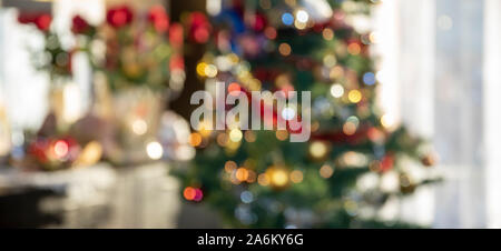 christmas background. lights of christmas tree blurred shallow depth of field Stock Photo