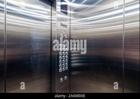 Russia, Moscow- June 11, 2019: interior room apartment. standard repair decoration in hostel. passenger elevator in an apartment building, buttons Stock Photo