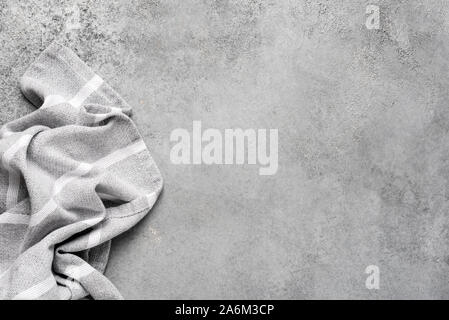 Linen kitchen napkin on grey concrete background. Design template element for restaurant or cafe menu, recipe, mock up Stock Photo