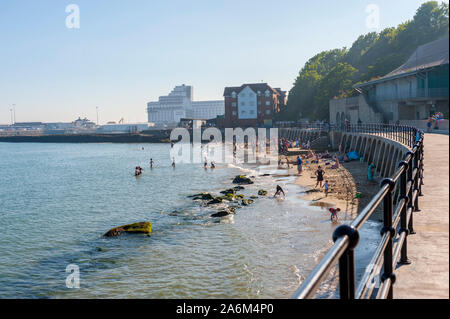 Sea front at Folkestone looking towards town at high tide Stock Photo