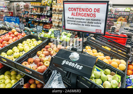 Valencia Spain,Quatre Carreres,Supercor Expres,convenience supermarket,inside interior,display sale,fruit,bins,apples,pears,sign,allergens information Stock Photo