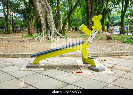 Gym Machines in a Public Park in Medellin, Antioquia / Colombia Stock Photo