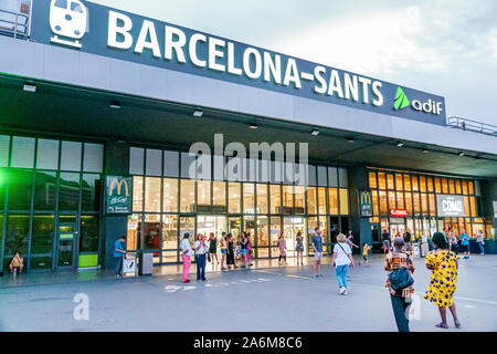 Barcelona Spain,Catalonia Barcelona-Sants Renfe train station,exterior,plaza,Black,woman,man,passengers riders,front entrance,ES190831085 Stock Photo