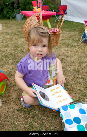 Child sat on floor playing with lego Stock Photo - Alamy