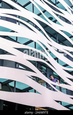 Barcelona Spain,Catalonia Passeig de Gracia,shopping district,Suites Avenue,hotel,building exterior,stainless steel facade,by Toyo Ito,contemporary ar Stock Photo