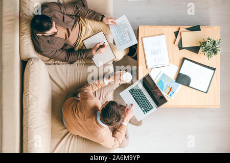 Two creative interface designers developing brand new software for smartphones Stock Photo