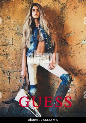 poster advertising GUESS with Vanessa Hessler in paper magazine from 2010 year, advertisement, creative GUESS advert from 2010s Stock Photo