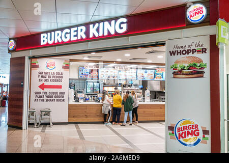 Barcelona Spain,Catalonia Barcelona-El Prat Josep Tarradellas Airport BCN,terminal T1,Burger King,fast food restaurant,counter,front entrance,inside,E Stock Photo