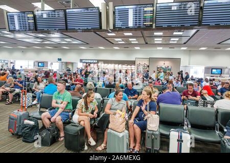 Fort Ft. Lauderdale Florida,Fort Lauderdale-Hollywood International Airport FLL,Terminal 2,inside,passenger waiting area,seating,crowded,man,woman,lug Stock Photo