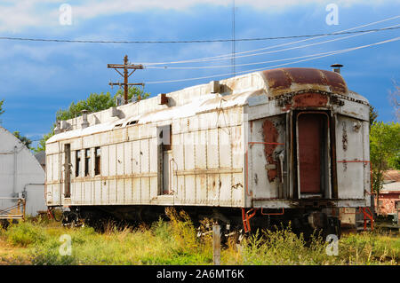 An old neglected rail car sitting by itself showing the wear of time Stock Photo