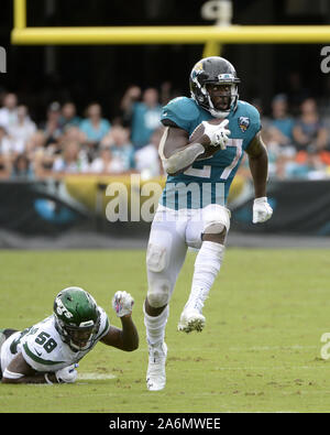 Jacksonville, USA. 27th Oct, 2019. Jacksonville Jaguars Running Back Leonard Fournette (27) runs for 26 yards during the fourth quarter as the New York Jets play the Jaguars at the TIAA Bank Field in Jacksonville, Florida on Sunday, October 27, 2019. The Jaguars defeated the Jets 29-15. Photo by Joe Marino/UPI Credit: UPI/Alamy Live News Stock Photo