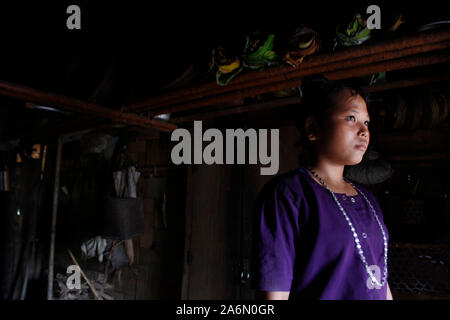 A woman from the ethnic Murong (also Mro or Mru) community, in Lama, Bandarban, Bangladesh. July 29, 2010. Stock Photo