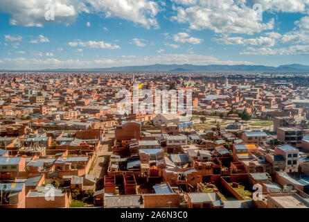 The City of El Alto/La Paz, Bolivia Seen From the Sky With High Mountains Peaks of the Andes Cordillera Stock Photo