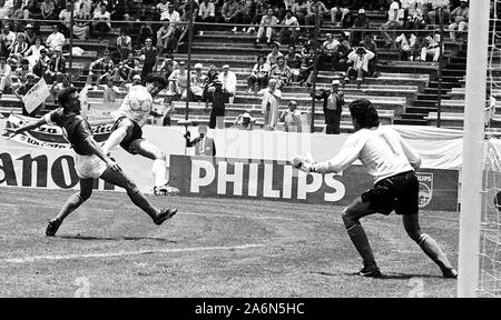 Diego Maradona scores to tie the game agains Italy, for the phase group of World Cup Mexico 86 Stock Photo