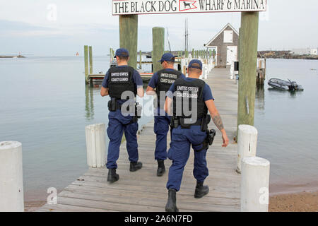 United States Coast Guard officers at Black Dog Wharf, Vineyard Haven, Martha’s Vineyard, Massachusetts, USA Stock Photo