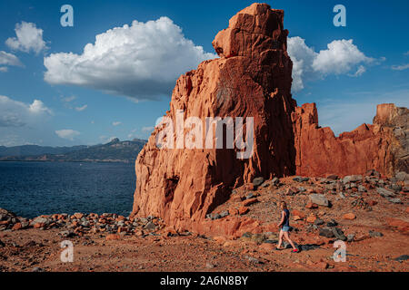 ARBATAX, ITALY / OCTOBER 2019: The scenic red rocks beach in Sardinia, Ogliastra region Stock Photo