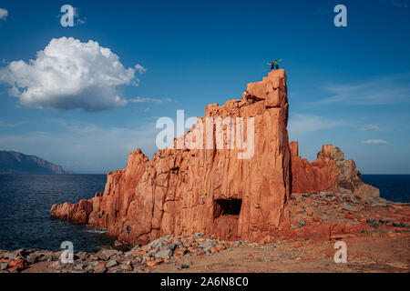 ARBATAX, ITALY / OCTOBER 2019: The scenic red rocks beach in Sardinia, Ogliastra region Stock Photo