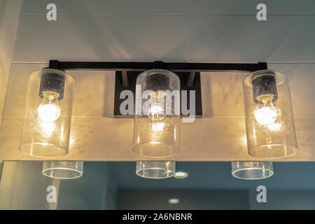 Close up of contemporary bathroom mirror lights Stock Photo