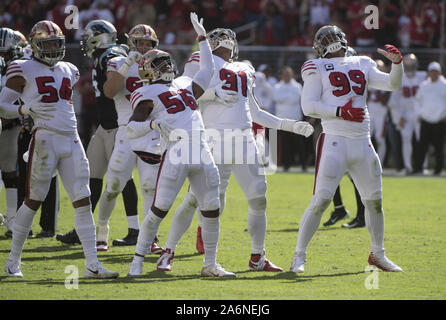 October 27, 2019: San Francisco 49ers defensive linebacker Nick Bosa (97)  pushes back on Carolina Panthers wide receiver D.J. Moore (12) during in  fourth quarter interception, during a NFL game between the