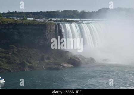 View of Niagara Falls along the banks of the Niagara River on the Canadian side Stock Photo
