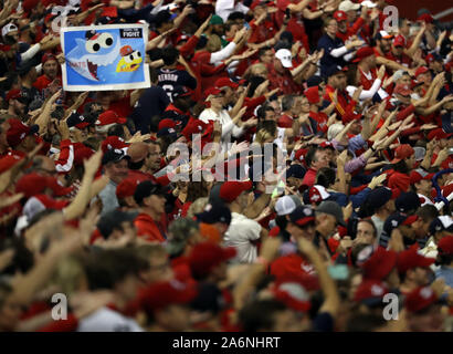 Washington, USA. 27th Oct, 2019. Washington Nationals fans cheer to 'Baby shark' during Game 5 of the World Series against the Houston Astros at Nationals Park in Washington, DC on Sunday, October 27, 2019. Photo by Mark Abraham/UPI Credit: UPI/Alamy Live News Stock Photo