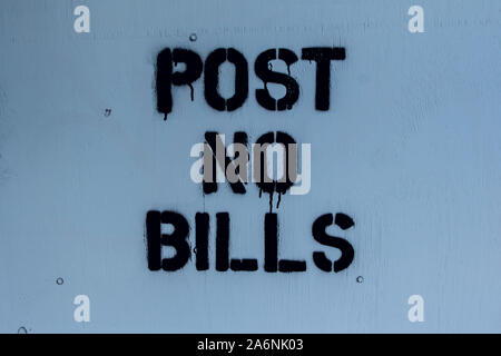 post no bills painted on grea wood background Stock Photo