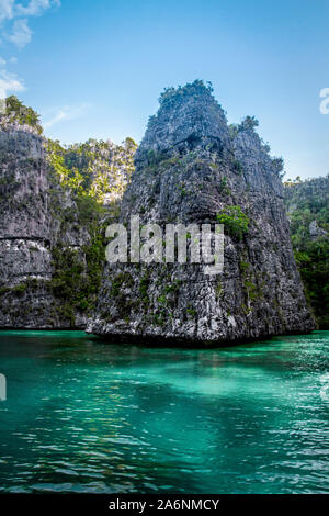 Great adventure travel in-between beautiful small island at Raja Ampat Stock Photo