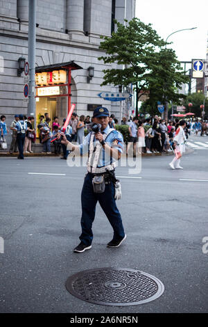 Japanese traffic officer during festival Kyoto, Japan 29-7-19 Stock Photo