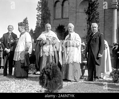 Religious leaders procession in outdoor religious event ca. 1919 Stock Photo