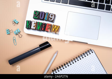 2019 Review. Financial reports, summary, achievement of goals, New Year concept. Colorful wooden alphabet letters Stock Photo
