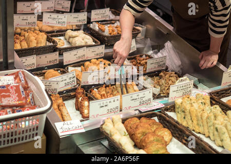 Street food in traditional market, Kyoto, Japan, 3 august 2019 Stock Photo