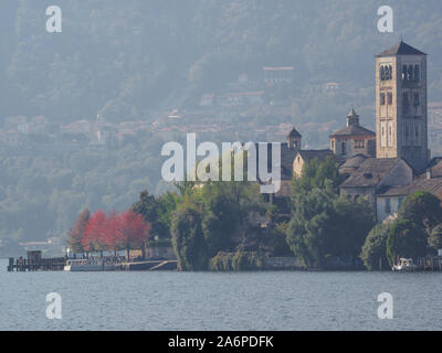 autumn colors on the island of San Giulio, Orta lake. Piedmont Stock Photo
