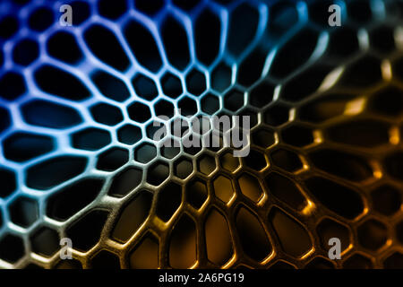 Abstract background of distorted mesh with hexagonal holes. Stock Photo