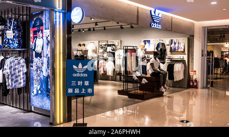 Special Sale in Adidas. Shop in Chinese mall. French brand having in asia, China, Dalian, june 2019 Stock Photo - Alamy
