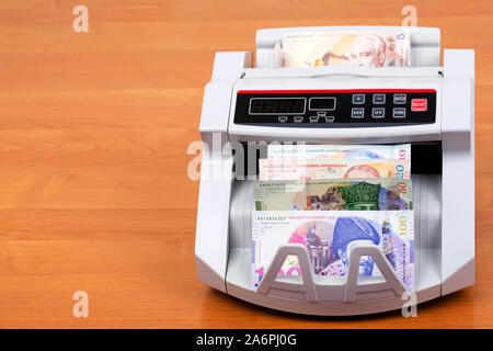 Georgian Lari in a counting machine Stock Photo