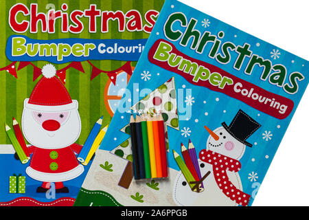 Christmas Bumper Colouring books with colouring pencils set on white ...