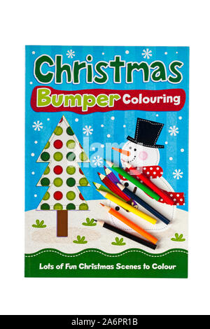 Christmas Bumper Colouring book with colouring pencils isolated on white background Stock Photo