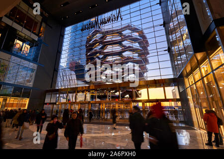 New York City Hudson Yards interior with view on The Vessel (staircase) at sunset. Midtown West, Manhattan, NY, USA Stock Photo