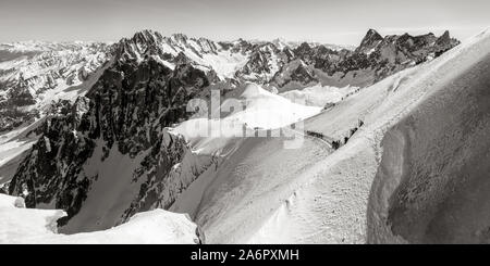 Extreme skiing in the Mont Blanc massif, Aiguille du Midi ridge and Vallée Blanche. Chamonix, Haute-Savoie, Alps, France (Black & White) Stock Photo