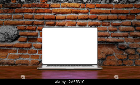Laptop template isolated on brick background. Mockup, design. Stock Photo