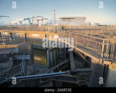 Lock gate mechanism Cardiff Barrage in Cardiff, Wales, UK - this opens and closes the gate to allow entry and exit of boats. Stock Photo