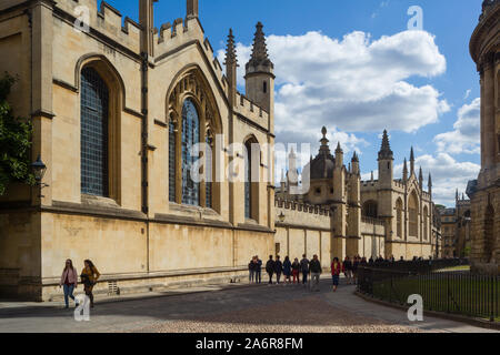 People walk by the facade of All Souls College, Oxford on Catte Street, part of Oxford University Stock Photo
