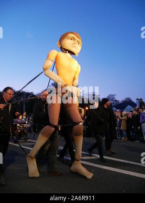 Dublin. 28th Oct, 2019. People participate in a Halloween parade in Galway, Ireland, Oct. 27, 2019. A Halloween parade was held here on Sunday night, attracting thousands of local residents and tourists. Credit: Xinhua/Alamy Live News Stock Photo