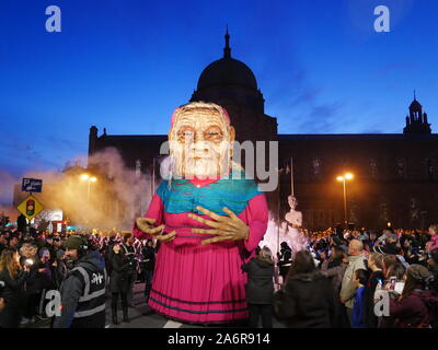 Dublin. 28th Oct, 2019. People participate in a Halloween parade in Galway, Ireland, Oct. 27, 2019. A Halloween parade was held here on Sunday night, attracting thousands of local residents and tourists. Credit: Xinhua/Alamy Live News Stock Photo